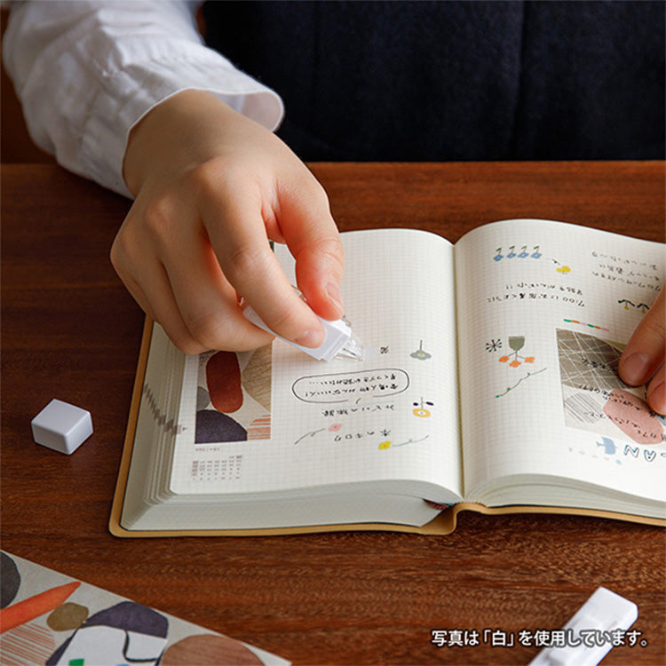 Midori XS correction tape black white